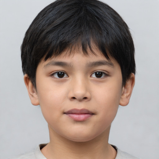 Neutral asian child male with short  brown hair and brown eyes