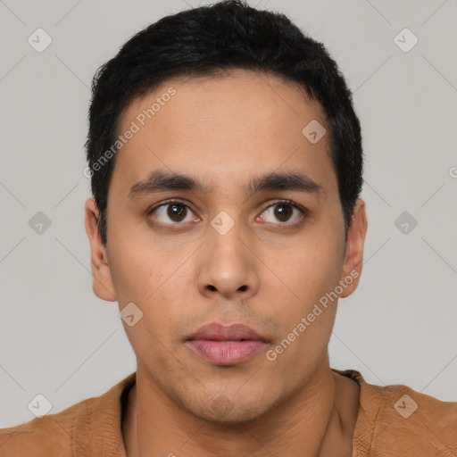 Neutral latino young-adult male with short  black hair and brown eyes