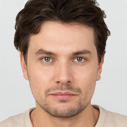 Neutral white young-adult male with short  brown hair and brown eyes