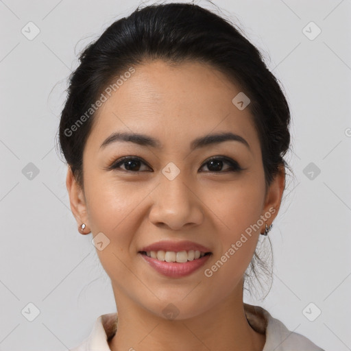 Joyful asian young-adult female with medium  brown hair and brown eyes