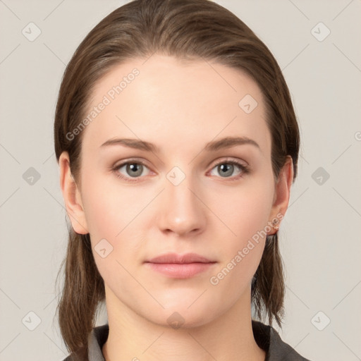 Neutral white young-adult female with medium  brown hair and grey eyes