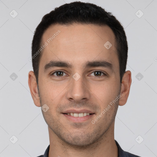 Joyful white young-adult male with short  brown hair and brown eyes