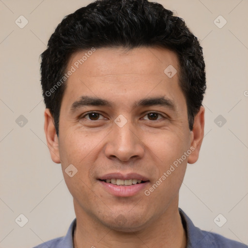 Joyful white young-adult male with short  black hair and brown eyes
