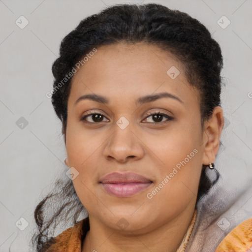 Joyful black young-adult female with short  brown hair and brown eyes