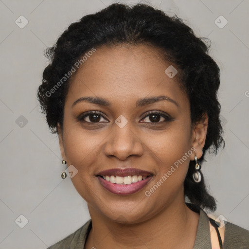 Joyful black young-adult female with long  brown hair and brown eyes