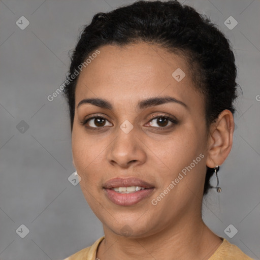 Joyful latino young-adult female with short  brown hair and brown eyes