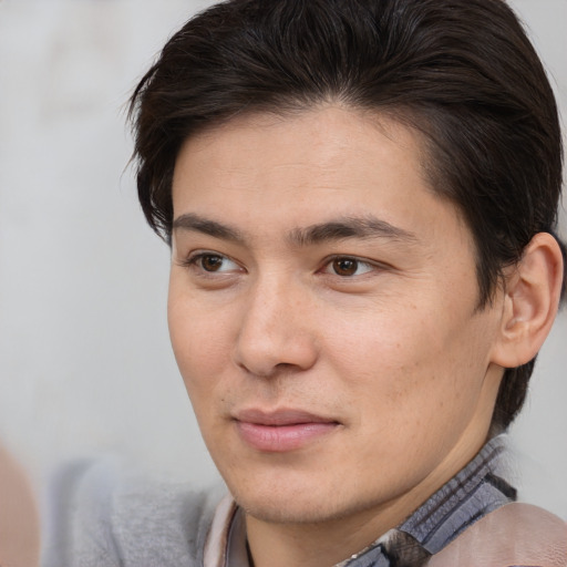 Joyful white young-adult male with medium  brown hair and brown eyes