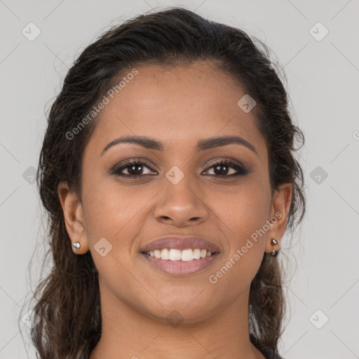 Joyful latino young-adult female with long  brown hair and brown eyes