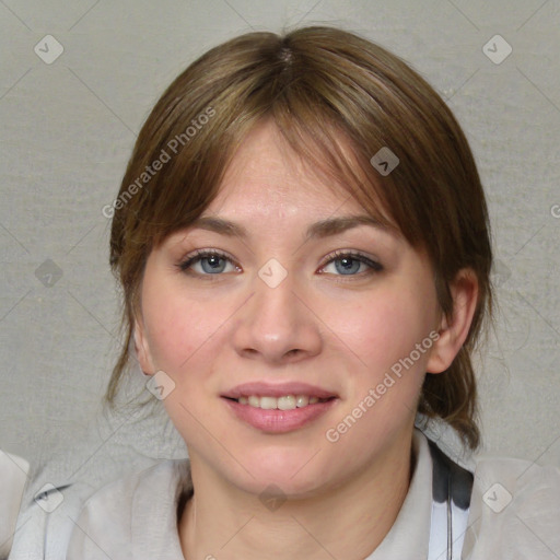 Joyful white young-adult female with medium  brown hair and blue eyes