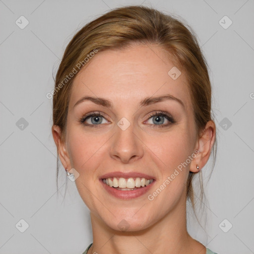 Joyful white young-adult female with medium  brown hair and blue eyes