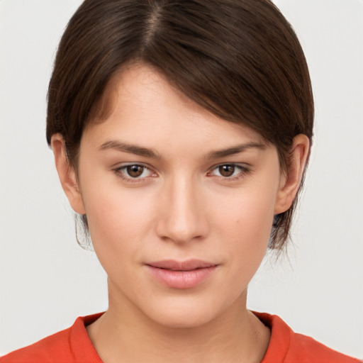 Neutral white young-adult female with short  brown hair and brown eyes