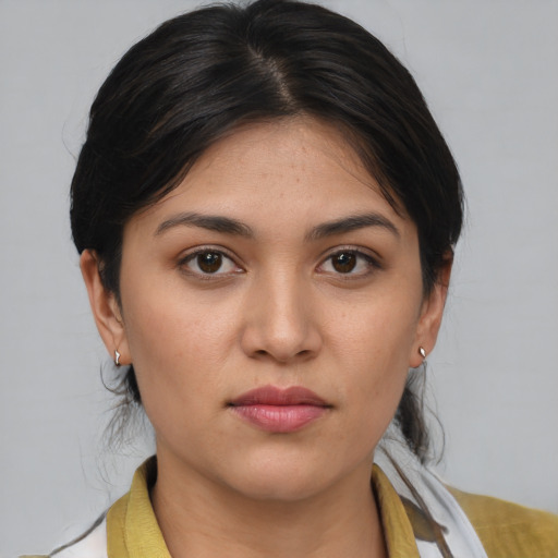 Joyful white young-adult female with medium  brown hair and brown eyes