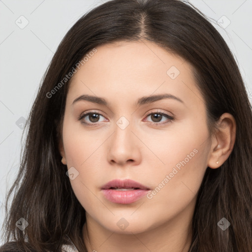 Neutral white young-adult female with long  brown hair and brown eyes