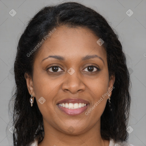 Joyful black young-adult female with medium  brown hair and brown eyes