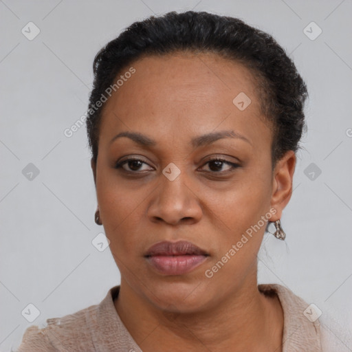 Neutral black adult female with short  black hair and brown eyes