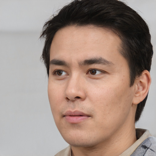 Neutral asian young-adult male with short  black hair and brown eyes
