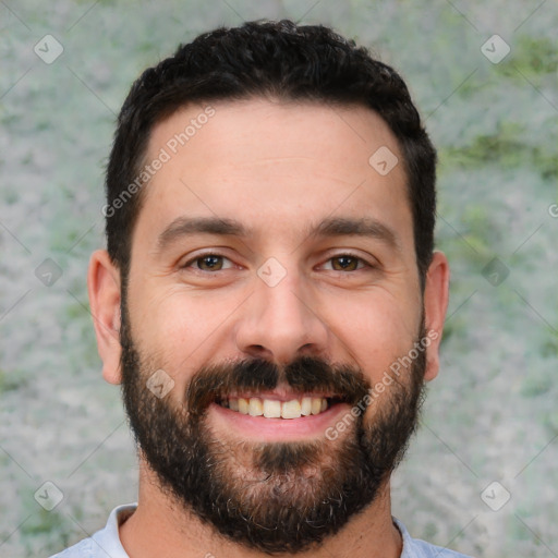 Joyful white young-adult male with short  black hair and brown eyes