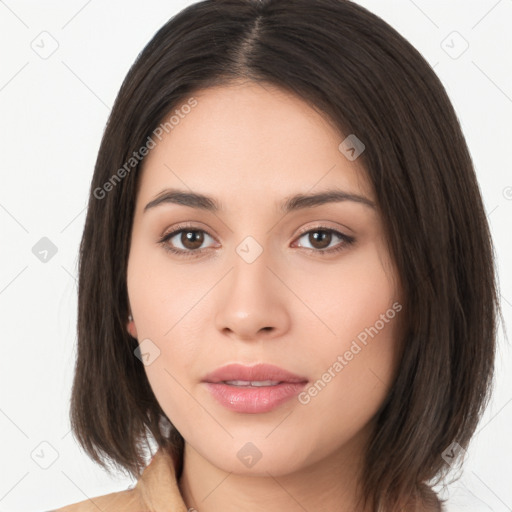 Neutral white young-adult female with long  brown hair and brown eyes