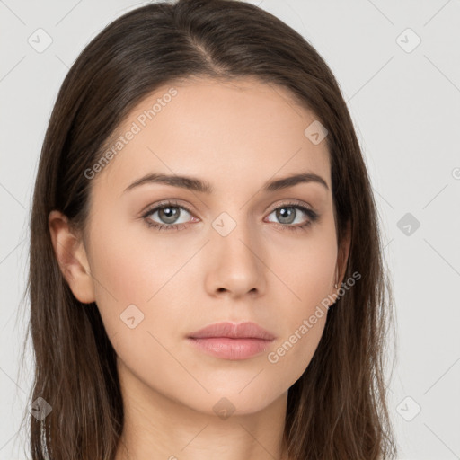 Neutral white young-adult female with long  brown hair and brown eyes