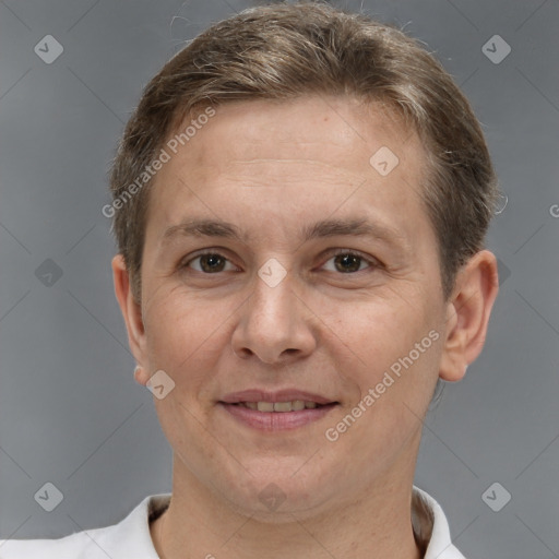 Joyful white adult female with short  brown hair and brown eyes