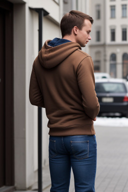 Estonian adult male with  brown hair