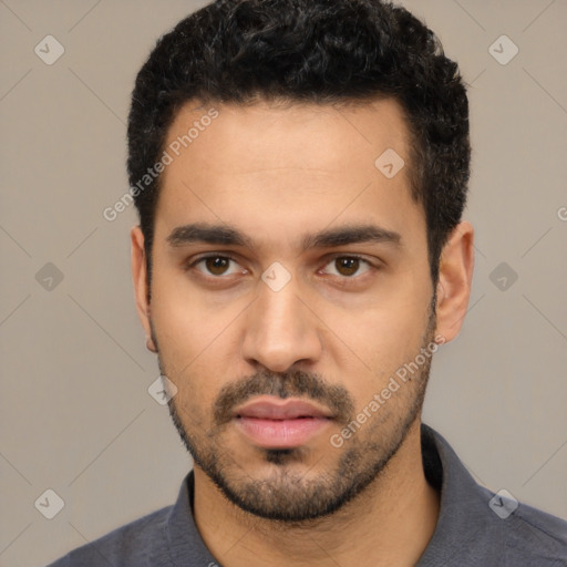 Neutral latino young-adult male with short  black hair and brown eyes