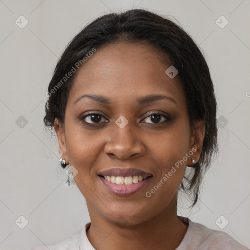 Joyful black young-adult female with medium  brown hair and brown eyes