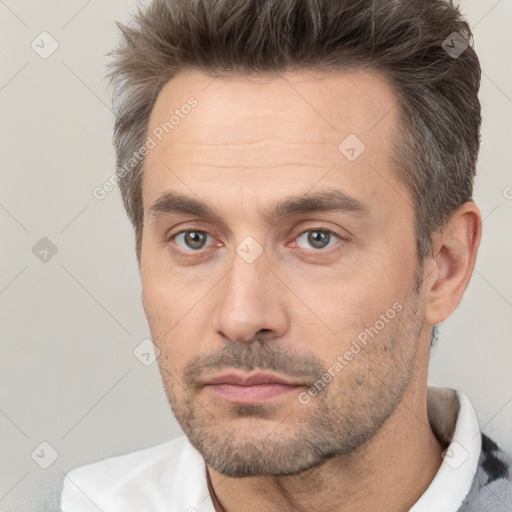 Neutral white adult male with short  brown hair and brown eyes