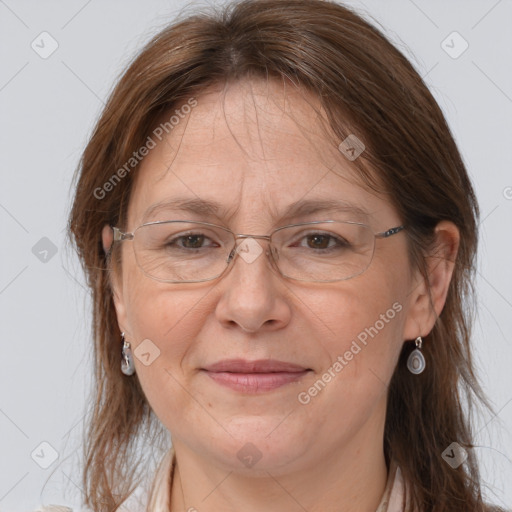 Joyful white adult female with medium  brown hair and brown eyes