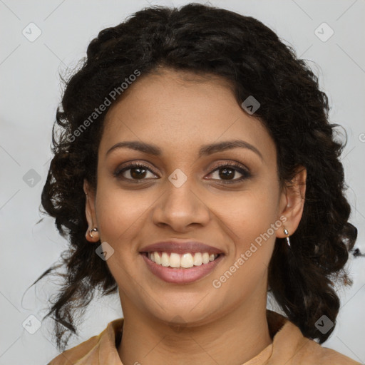 Joyful black young-adult female with medium  brown hair and brown eyes