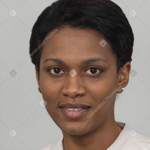 Joyful black young-adult female with short  black hair and brown eyes