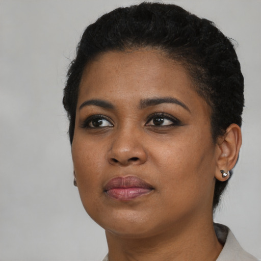 Neutral black young-adult female with short  black hair and brown eyes