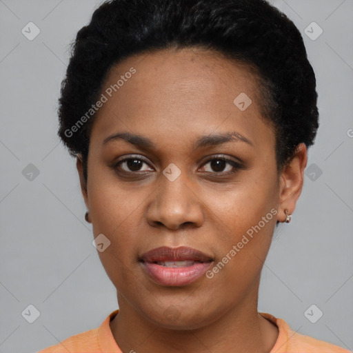 Joyful black young-adult female with short  black hair and brown eyes