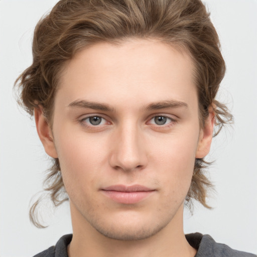 Neutral white young-adult male with medium  brown hair and brown eyes