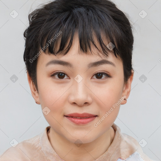 Joyful asian young-adult female with short  brown hair and brown eyes