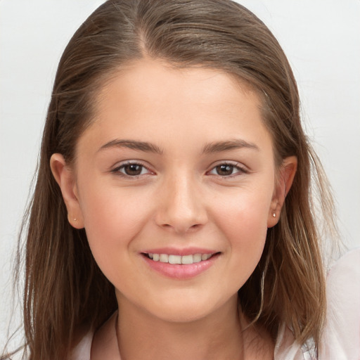 Joyful white child female with medium  brown hair and brown eyes