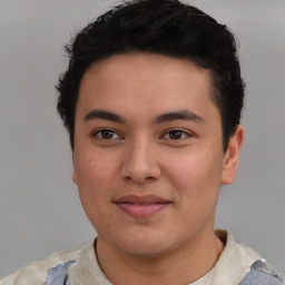 Joyful latino young-adult male with short  brown hair and brown eyes