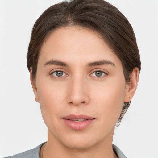 Neutral white young-adult female with short  brown hair and brown eyes