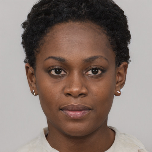 Neutral black young-adult female with short  brown hair and brown eyes