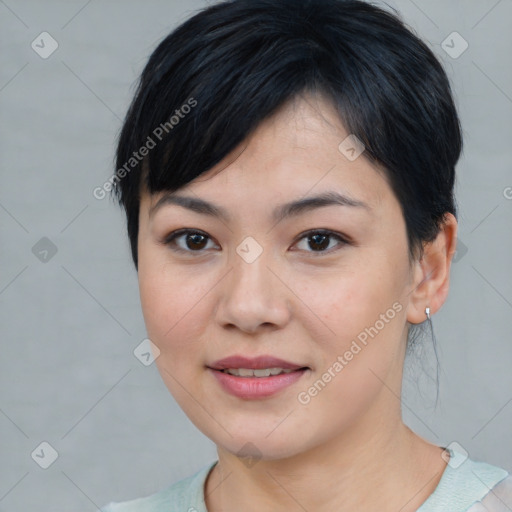 Joyful asian young-adult female with medium  brown hair and brown eyes