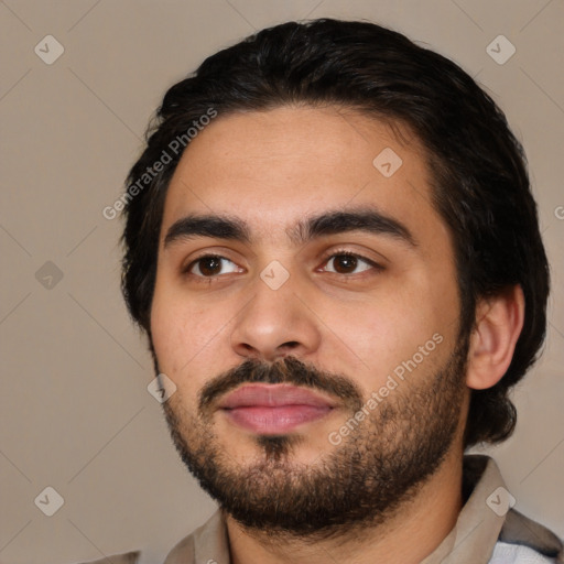 Neutral latino young-adult male with short  black hair and brown eyes