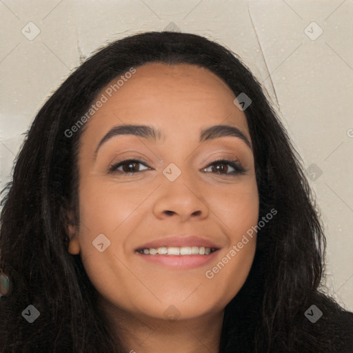 Joyful latino young-adult female with long  black hair and brown eyes