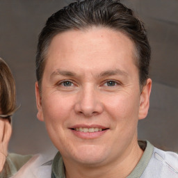 Joyful white adult female with short  brown hair and brown eyes