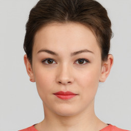 Neutral white young-adult female with short  brown hair and brown eyes