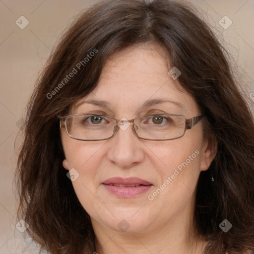 Joyful white adult female with long  brown hair and brown eyes