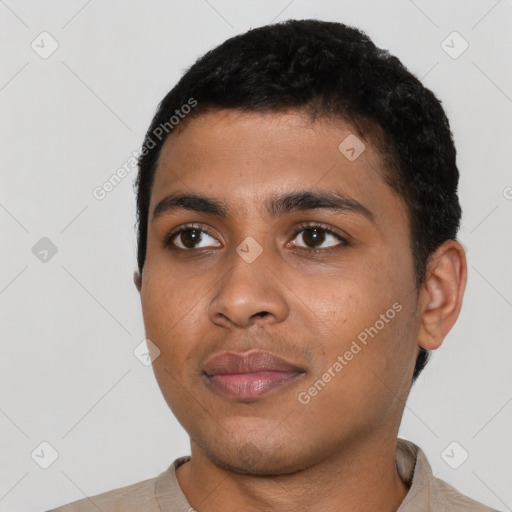 Neutral latino young-adult male with short  black hair and brown eyes