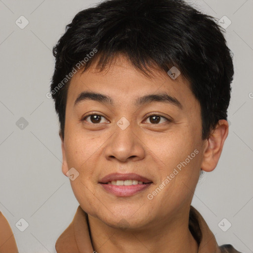 Joyful asian young-adult male with short  brown hair and brown eyes