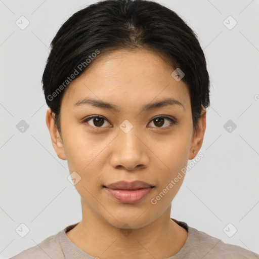 Joyful asian young-adult female with short  black hair and brown eyes