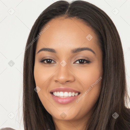 Joyful latino young-adult female with long  brown hair and brown eyes