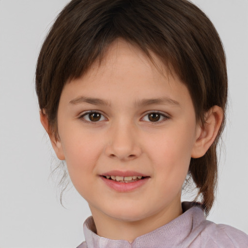 Joyful white child female with medium  brown hair and brown eyes